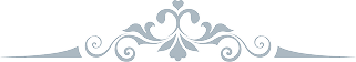 Silver ornamental flourish divider on black