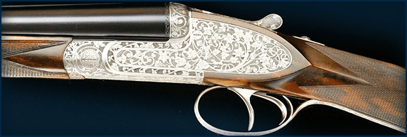 Engraved double-barrel shotgun close-up
